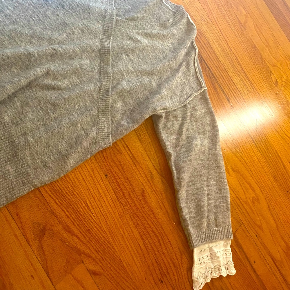 Wrap sweater with lace details on sleeves